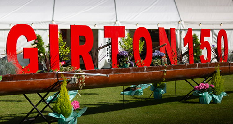 Girton 150 sign on a rowing boat