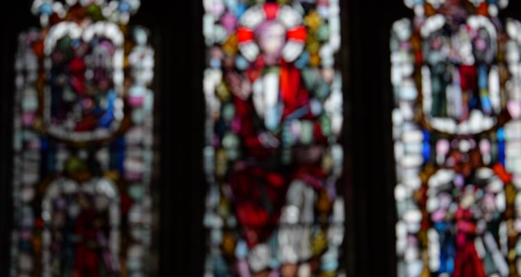 Out of focus photograph of the stained glass window in Girton College Chapel