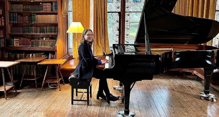 Sofia Vasieva playing piano, taken by Dr Elisabeth Kendall