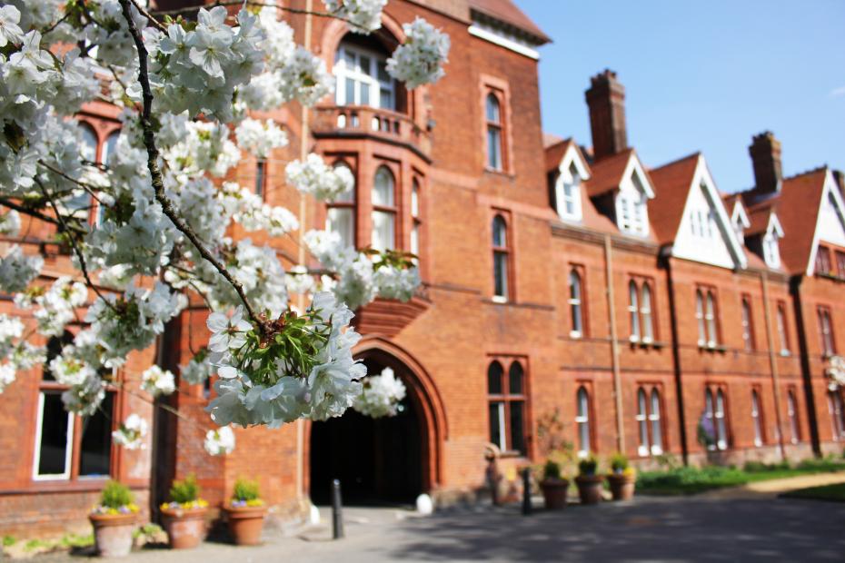 Girton College Tower and tree blossom